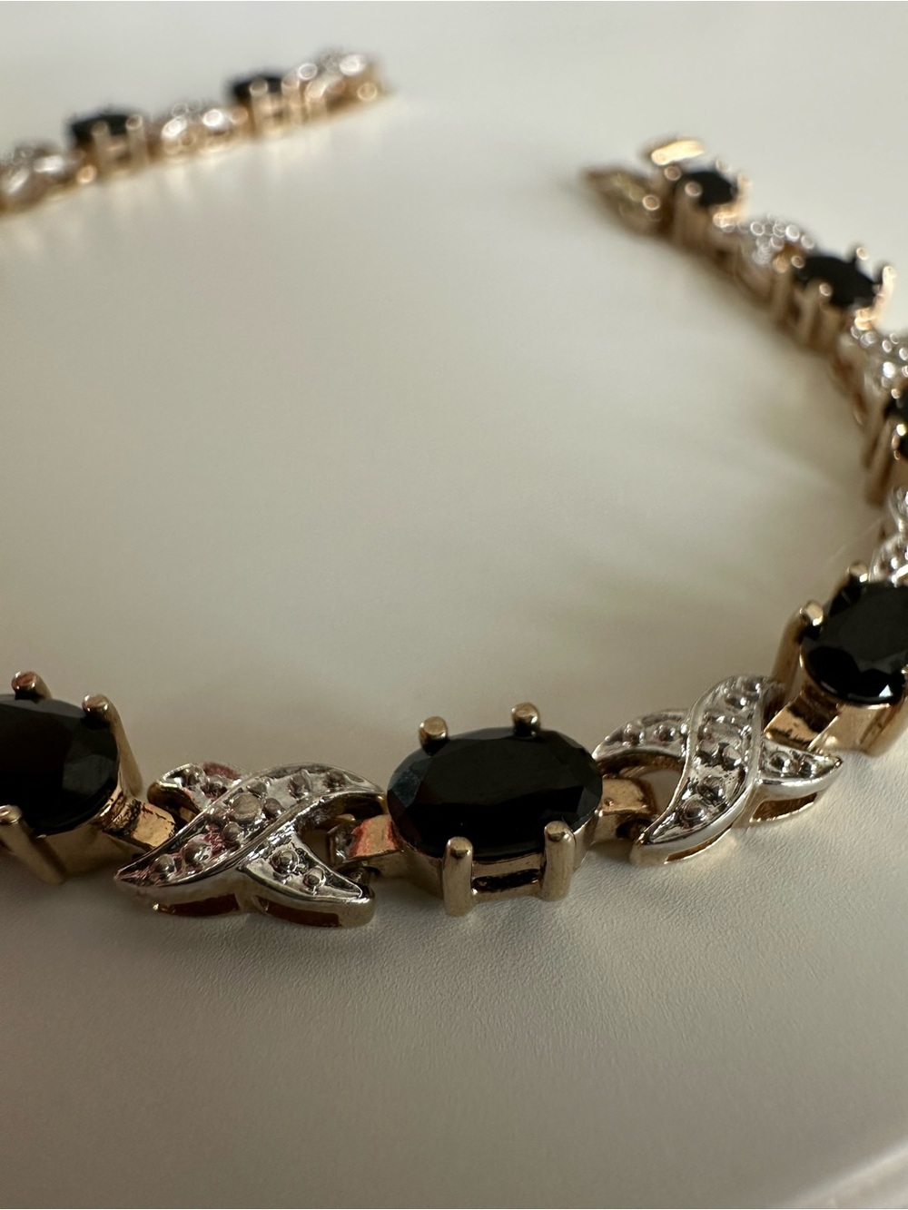 Elegant Black Stone XO Tennis Bracelet Gold Tone
